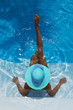 Photo: Woman relaxing in a swimming pool Woman relaxing in a swimming pool