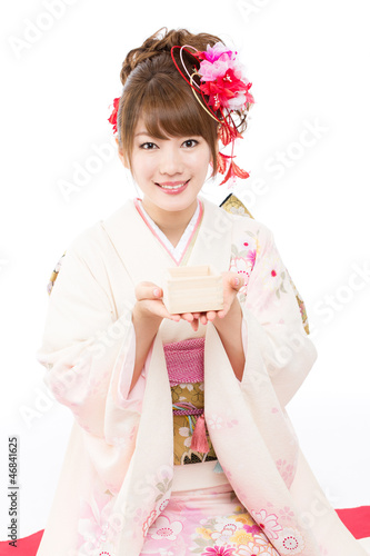 Photo: Beautiful japanese kimono woman on white background Beautiful japanese kimono woman on white background