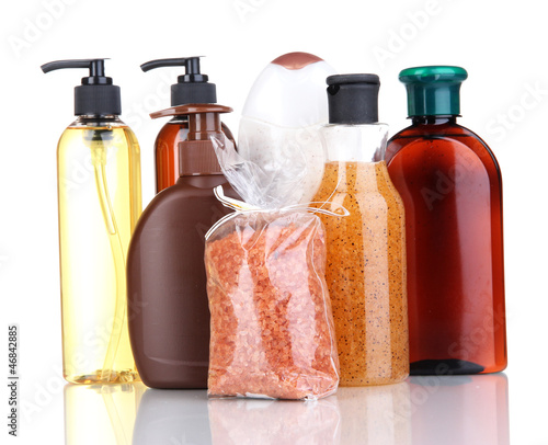 Photo: cosmetic bottles isolated on white cosmetic bottles isolated on white