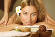 Beautiful woman on massage table