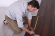 Man using a measuring tape