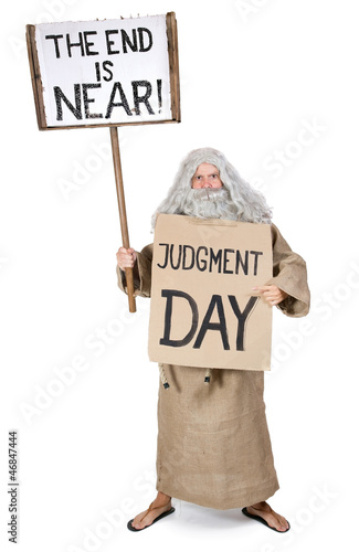 Photo: visionary with a sign of the end is near visionary with a sign of the end is near