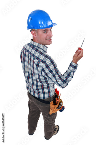 Photo: Worker with an awl Worker with an awl