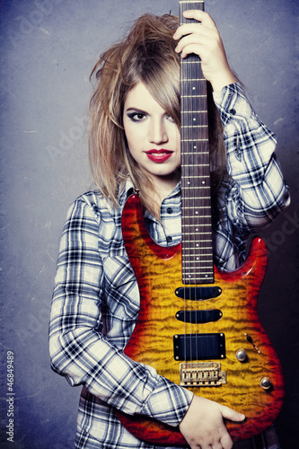 Photo: Style girl with guitar. Style girl with guitar.
