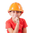 Girl in a protective helmet sits