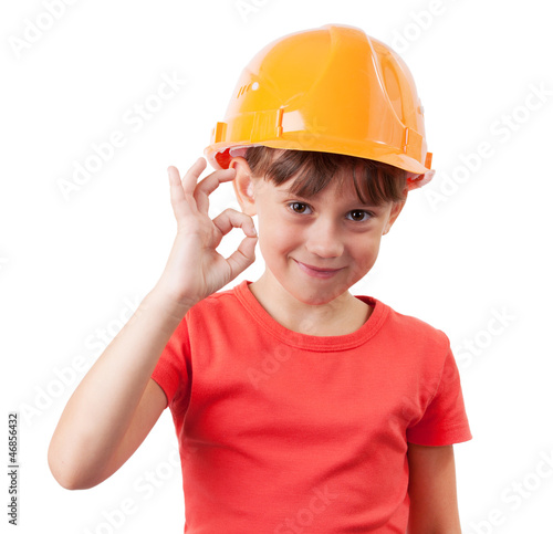 Photo: Girl in a protective helmet Girl in a protective helmet