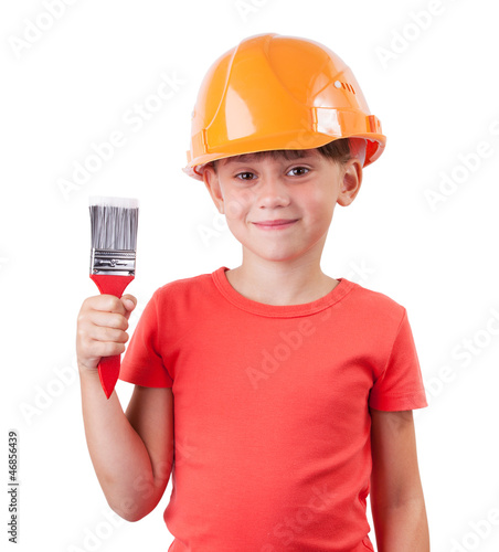 Photo: Girl in a protective helmet sits Girl in a protective helmet sits