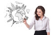 Young woman drawing a globe on whiteboard