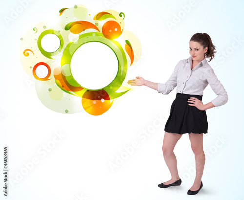 Photo: Young business woman presenting abstract copyspace Young business woman presenting abstract copyspace