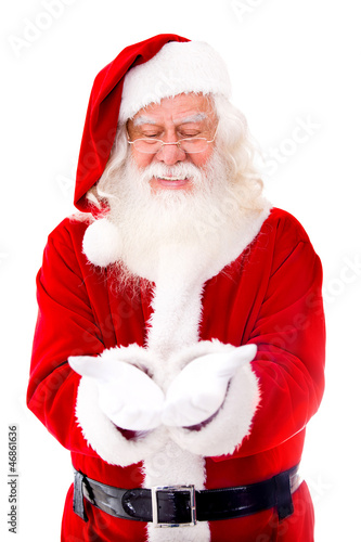 Photo: Santa Claus holding something Santa Claus holding something