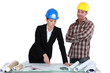 Architect and builder discussing plans
