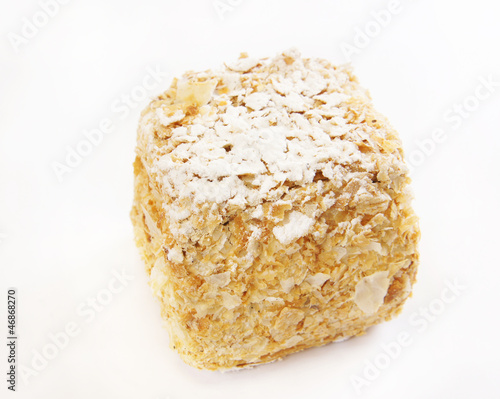 Photo: Square cake covered with sugar powder Square cake covered with sugar powder