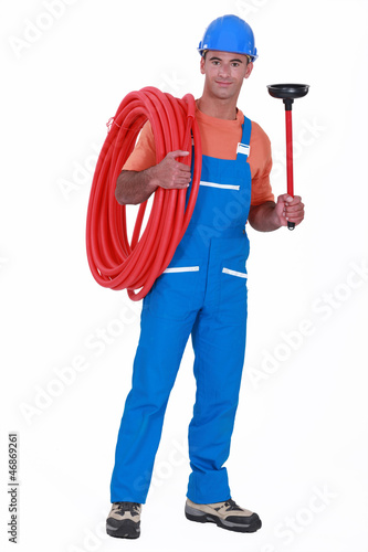 Photo: A plumber. A plumber.