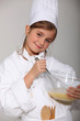 portrait of a little girl in baker clothes