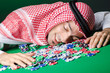Arab playing in casino - gambling concept with man