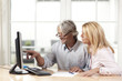 Colleagues working on computer