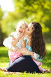 Mother and daughter in the park