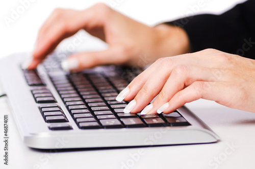 Photo: Hands working on the keyboard Hands working on the keyboard