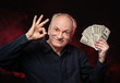 old man with dollar bills