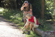 A mature couple resting beside a country path