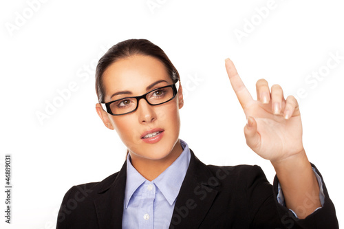 Photo: Businesswoman using a virtual interface Businesswoman using a virtual interface