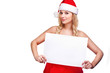 woman in santa hat holding empty board