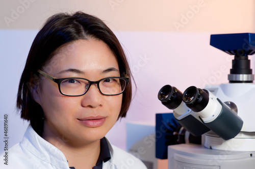 Photo: Young oriental microscopist Young oriental microscopist