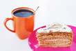 Triangle cake with cup of coffee