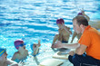 happy children group  at swimming pool
