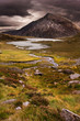 Moody dramatic mountain sunset landscape