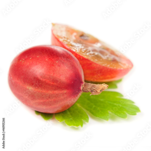 Photo: Red Gooseberries with Green Leaf Isolated on White Background Red Gooseberries with Green Leaf Isolated on White Background
