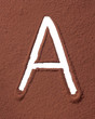 Letter A made of cocoa powder