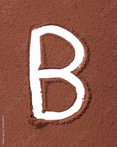 Photo: Letter B made of cocoa powder Letter B made of cocoa powder