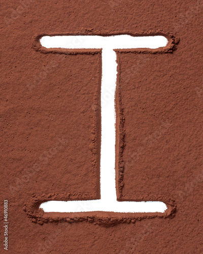 Photo: Letter I made of cocoa powder Letter I made of cocoa powder