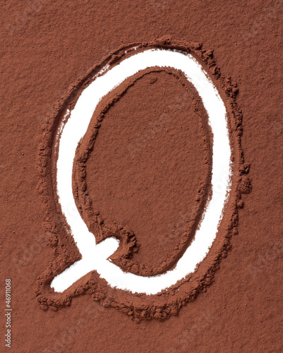 Photo: Letter Q made of cocoa powder Letter Q made of cocoa powder