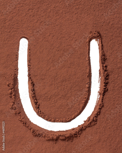 Photo: Letter U made of cocoa powder Letter U made of cocoa powder