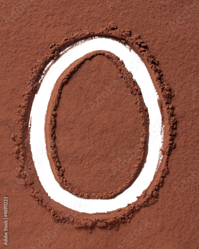 Photo: Letter O made of cocoa powder Letter O made of cocoa powder