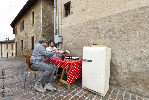 Photo: two men and kitchen in exterior two men and kitchen in exterior