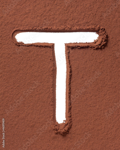 Photo: Letter T made of cocoa powder Letter T made of cocoa powder
