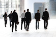 Employees going against the office. Panorama.