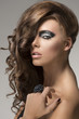 sexy girl with creative hairstyle turned at right