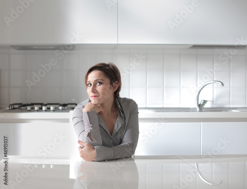 Photo: Woman in the Kitchen Woman in the Kitchen