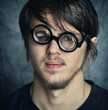 young man in a funny glasses.