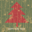 New year tree symbol with greetings on wooden planks texture. Ve