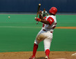 Baseball batter hitting the ball
