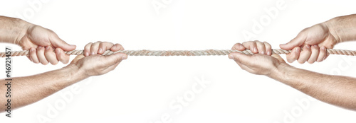 Photo: Two people are pulling a rope competing hands. On a white backgr Two people are pulling a rope competing hands. On a white backgr
