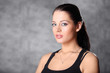 Photo: Portrait of beautiful brunette girl in shirt in photo studio Portrait of beautiful brunette girl in shirt in photo studio