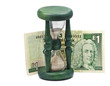 Sand-glass and bank-note as a symbol  not to waste time