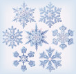 Vector: Set of ornate three-dimensional snowflakes icons. Set of ornate three-dimensional snowflakes icons.