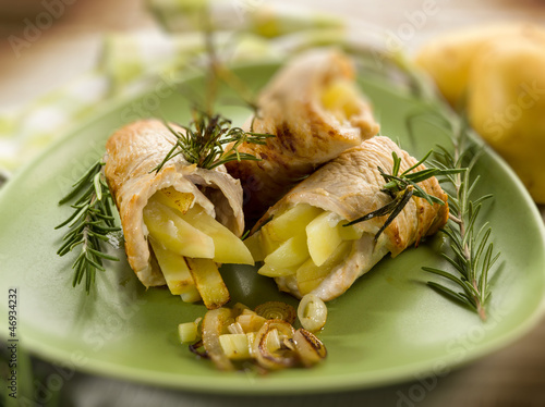 Photo: chicken stuffed with fried potatoes, selective focus chicken stuffed with fried potatoes, selective focus